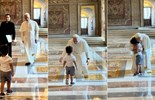 Đức Thánh Cha Lêô và sự hồn nhiên của một em bé qua một cái ôm bất ngờ